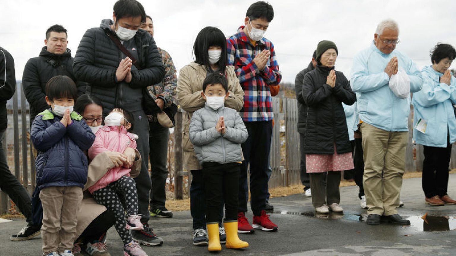 Bells and sirens as Japan marks tsunami anniversary, pledges recovery