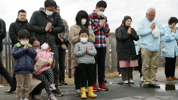 Bells and sirens as Japan marks tsunami anniversary, pledges recovery Bells and sirens as Japan marks tsunami anniversary, pledges recovery