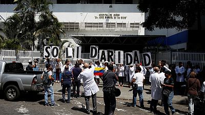 Doctors pray for sick as blackout batters Venezuelan hospitals Doctors pray for sick as blackout batters Venezuelan hospitals