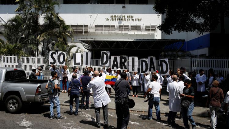 Doctors pray for sick as blackout batters Venezuelan hospitals