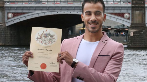 'I'm an Aussie': refugee footballer Araibi granted Australian citizenship 'I'm an Aussie': refugee footballer Araibi granted Australian citizenship