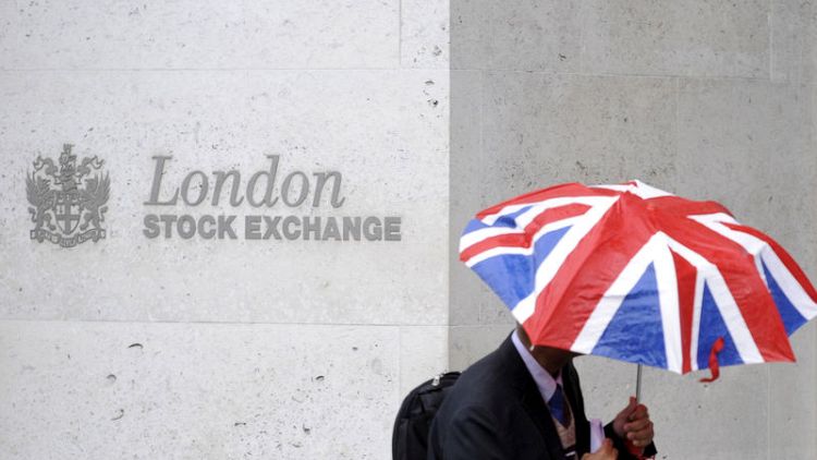 FTSE 100 buckles as sterling rallies on May's Brexit breakthrough