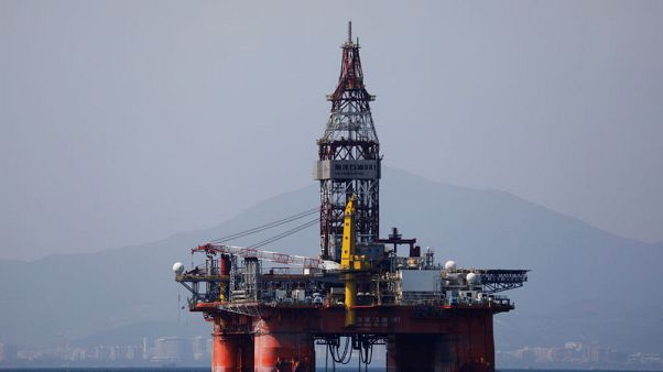 Oil edges higher, holds near 4-month top on supply cuts Oil edges higher, holds near 4-month top on supply cuts