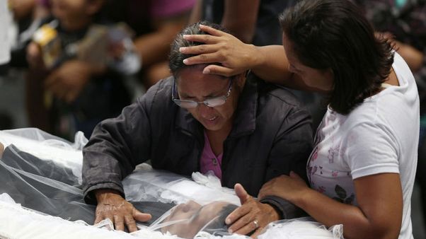 Brazil city burying eight victims of school attack Brazil city burying eight victims of school attack