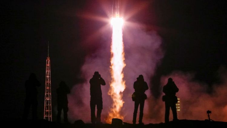 Russian space rocket lifts off with astronauts who survived rocket failure