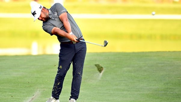 Golf - Moore passes Players' toughest test, others not so lucky at infamous 17th Golf - Moore passes Players' toughest test, others not so lucky at infamous 17th