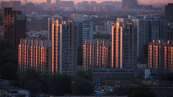 China's home price growth slips to 10-month low as economy slows China's home price growth slips to 10-month low as economy slows