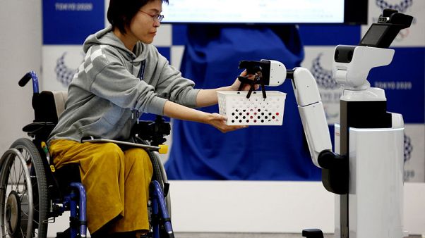Tokyo 2020 unveils robots to help wheelchair users, workers Tokyo 2020 unveils robots to help wheelchair users, workers