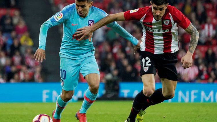 Atletico title hopes hit by limp defeat at Bilbao