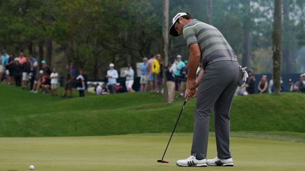 Golf - Rahm shoots 64 to lead McIlroy, Fleetwood at Players Golf - Rahm shoots 64 to lead McIlroy, Fleetwood at Players
