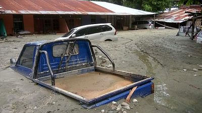 Flash floods kill at least 50 in Indonesia's Papua province Flash floods kill at least 50 in Indonesia's Papua province