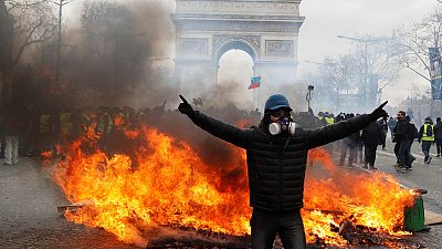 Parisians clean up after more weekend rioting on Champs Elysees Parisians clean up after more weekend rioting on Champs Elysees