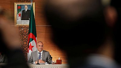 After weeks of protests, Algeria PM starts talks on new government After weeks of protests, Algeria PM starts talks on new government
