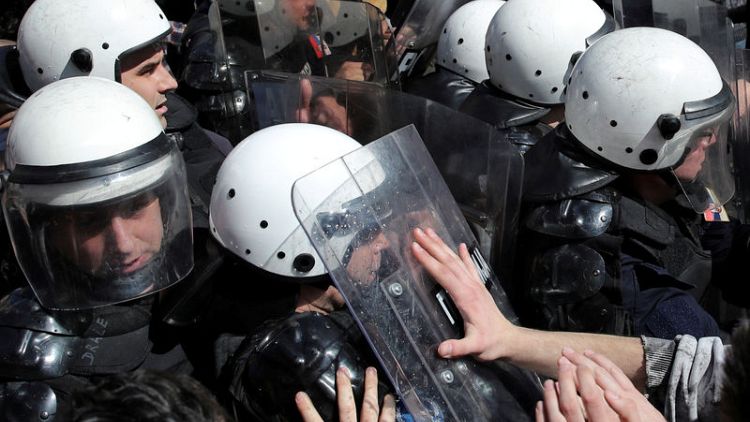 Protesters rally outside Serbia president's residence, police use pepper spray