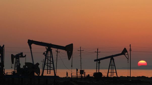 Oil eases on economic worries, but OPEC-led cuts support Oil eases on economic worries, but OPEC-led cuts support