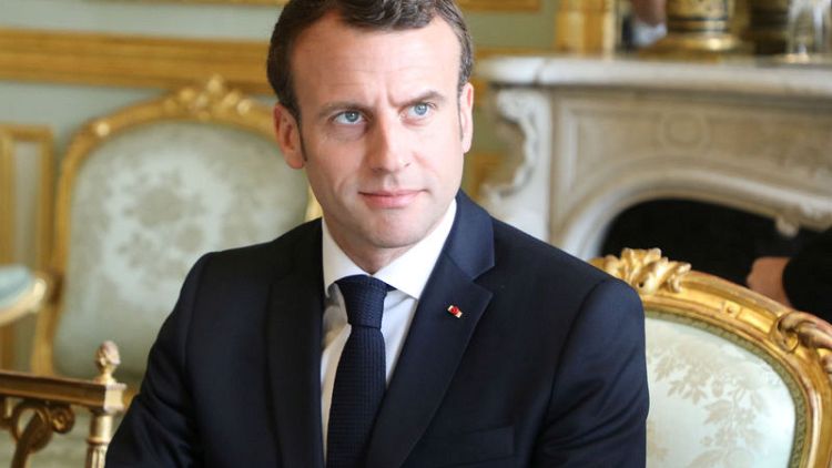 After Paris violence, pressure mounts on Macron's post-debate response