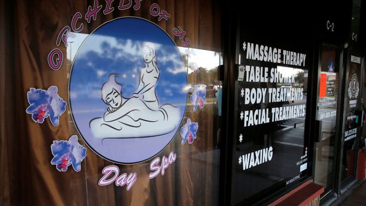U.S. Democrats target massage parlour proprietor linked to Trump