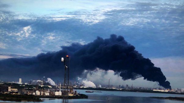 Texas petrochemical storage fire rages, may burn for two days Texas petrochemical storage fire rages, may burn for two days