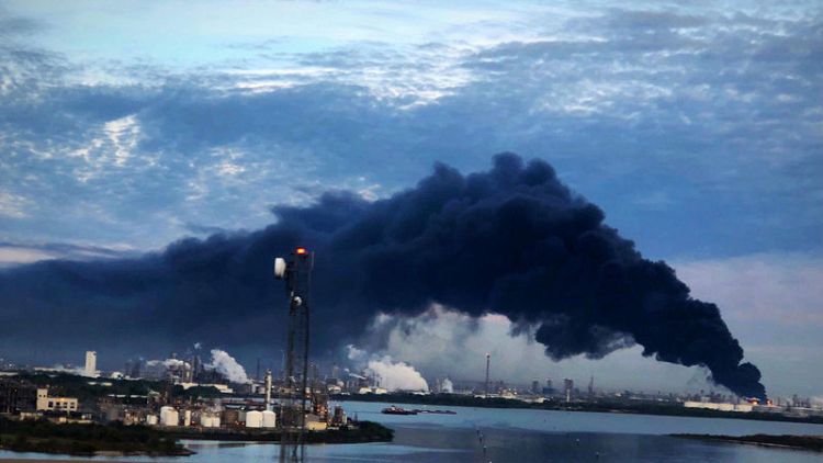 Texas petrochemical storage fire rages, may burn for two days