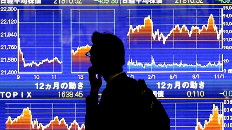 Asian shares steady ahead of Fed meeting; May's Brexit deal in chaos