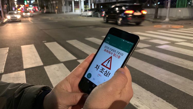 South Korea radar and thermal camera system warns 'smartphone zombies' of traffic