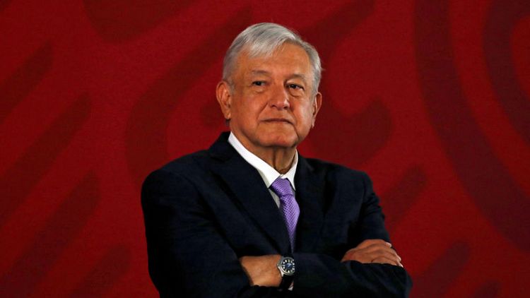 Mexico president Lopez Obrador signs vow he will not seek second term