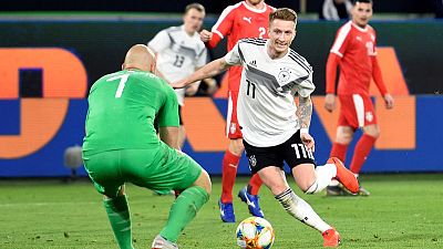 New-look Germany make promising start with Serbia draw New-look Germany make promising start with Serbia draw