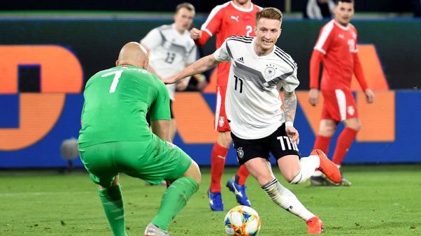 New-look Germany make promising start with Serbia draw New-look Germany make promising start with Serbia draw