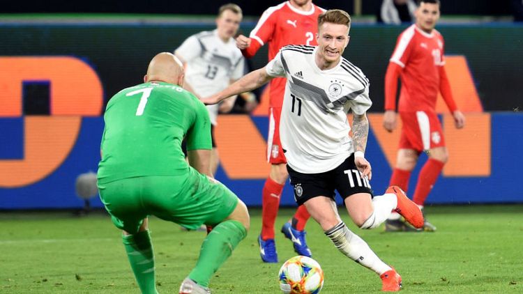 New-look Germany make promising start with Serbia draw