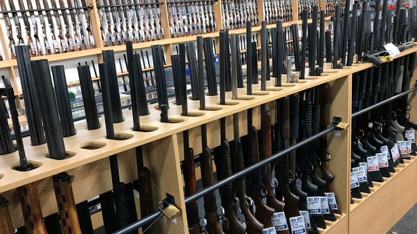 New Zealand bans semi-automatic and assault rifles after mass shooting New Zealand bans semi-automatic and assault rifles after mass shooting