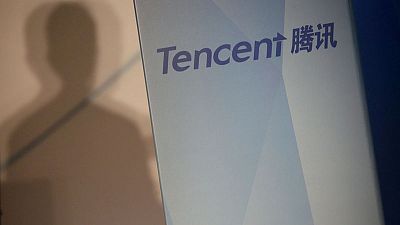 Tencent posts worst ever profit drop on gaming freeze, one-off charges Tencent posts worst ever profit drop on gaming freeze, one-off charges