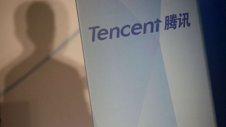 Tencent posts worst ever profit drop on gaming freeze, one-off charges