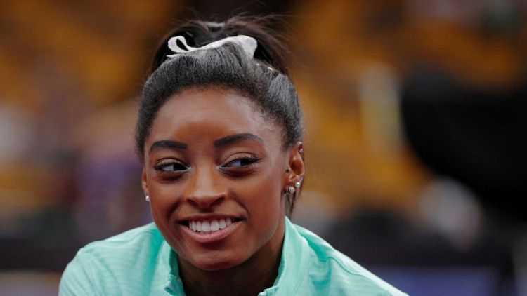 Gymnastics - U.S. team heading in positive direction from dark place, says Biles