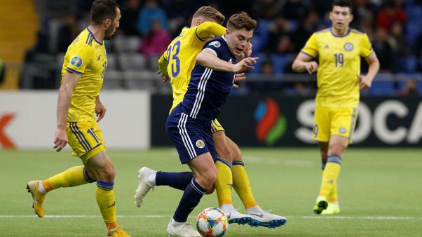 Kazakhstan thrash Scotland to launch Euro 2020 campaign Kazakhstan thrash Scotland to launch Euro 2020 campaign