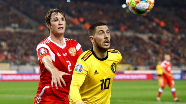 Belgium overcome Courtois howler to sink Russia Belgium overcome Courtois howler to sink Russia