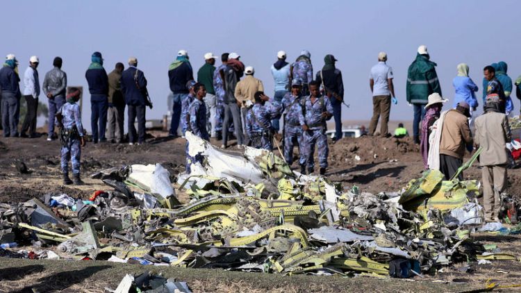Holding back at the scene of the Ethiopian Airlines crash