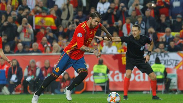 Nerveless Ramos gives Spain winning start Nerveless Ramos gives Spain winning start
