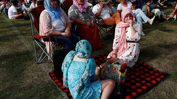 Thousands attend New Zealand vigil, rally to fight racism, remember Christchurch victims Thousands attend New Zealand vigil, rally to fight racism, remember Christchurch victims