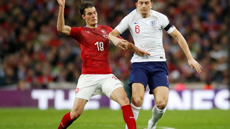 Referees must not penalise all contact in box, says Maguire