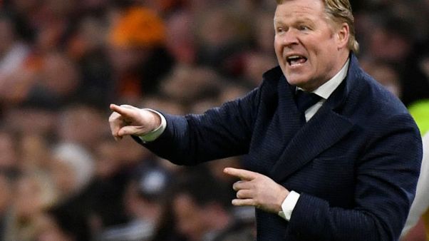 Mixed feelings for Dutch coach after cruel loss to Germany Mixed feelings for Dutch coach after cruel loss to Germany