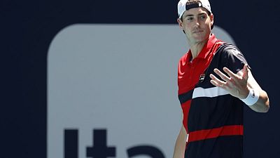 Tennis - Defending champion Isner into Miami quarters, Kyrgios out Tennis - Defending champion Isner into Miami quarters, Kyrgios out