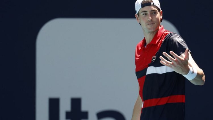 Tennis - Defending champion Isner into Miami quarters, Kyrgios out
