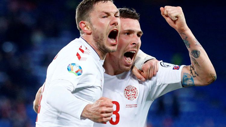 Denmark complete astonishing three-goal comeback to deny Switzerland