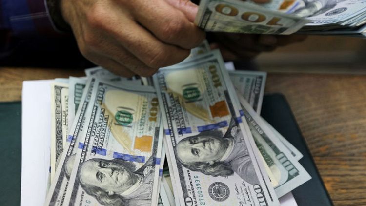 Dollar holds gains as risk appetite recovery arrests yield decline