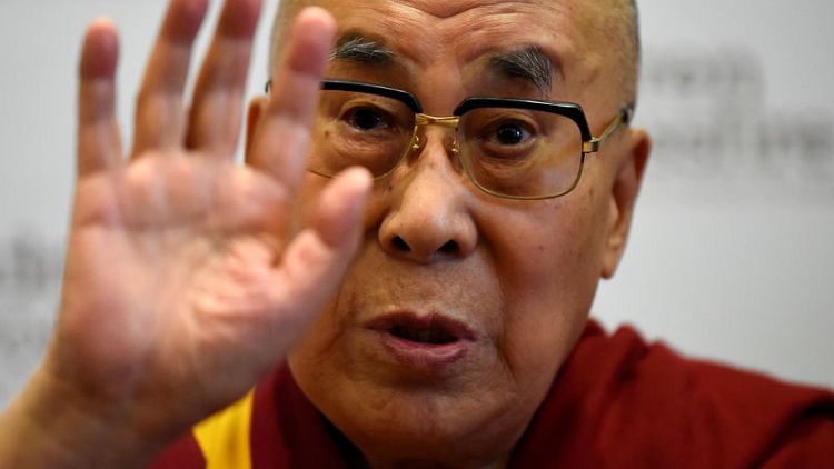 China says Tibet human rights critics 'bewitched' by Dalai Lama