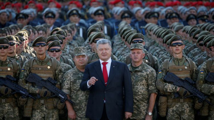 Ukraine's action man president faces voters' judgment