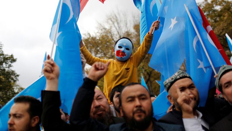 Without papers, Uighurs fear for their future in Turkey