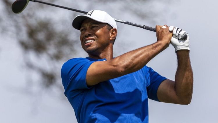 Golf - Tiger, McIlroy winners of their opening rounds at WGC-Match Play