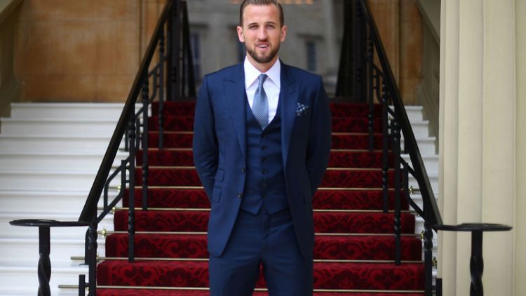 England soccer captain Kane honoured at Buckingham Palace