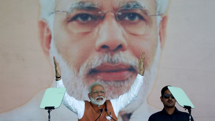 Two weeks before India starts voting, Modi predicts easy victory